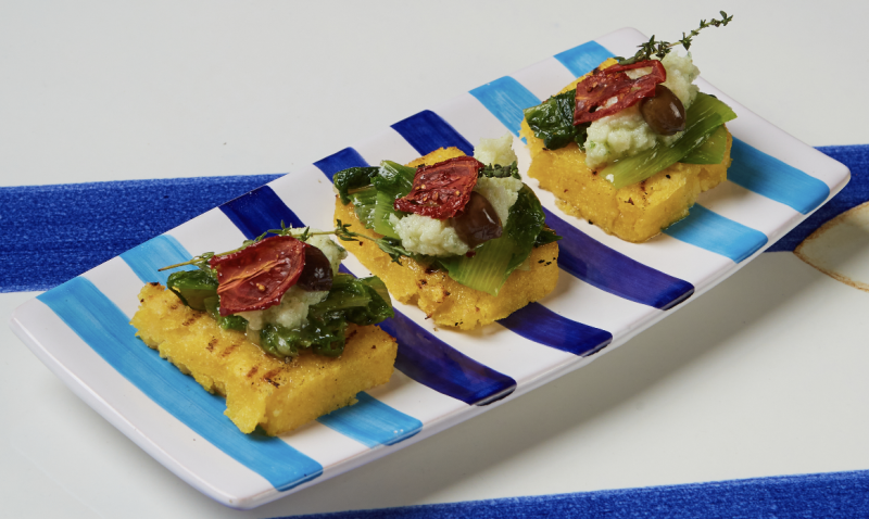 Crostoncini di polenta scarola e baccalà mantecato