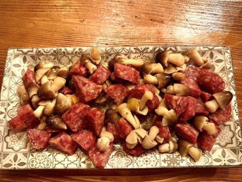 Wild boar salami in oil with honey mushrooms